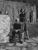 Max Ernst and Dorothea Tanning in the garden of their home with "La fête à Seillans". Seillans 1966. - Photo by Edward Quinn