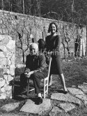 Max Ernst, Dorothea Tanning and their dog in the garden of their home with "La fête à Seillans". Seillans 1966. - Photo by Edward Quinn