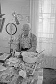 Max Ernst working on the sculpture "L'oiseau Janus" ("Vogel Janus") at his studio in Paris 1974. - Photo by Edward Quinn