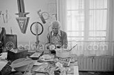 Max Ernst working on sculpture "L'oiseau Janus" ("Vogel Janus") at his studio in Paris 1974. - Photo by Edward Quinn