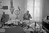 Max Ernst working on sculpture "L'oiseau Janus" ("Vogel Janus") at his studio in Paris 1974. - Photo by Edward Quinn