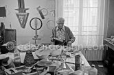 Max Ernst working on sculpture "L'oiseau Janus" ("Vogel Janus") at his studio in Paris 1974. - Photo by Edward Quinn
