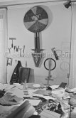 Max Ernst's tools at his studio. With an African tribal art mask. Paris 1974. - Photo by Edward Quinn