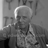 Max Ernst at his studio in Paris 1974. - Photo by Edward Quinn