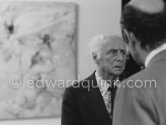 Max Ernst and Michel Guy (French ministre de la culture) at the opening of the exhibition "Dorothea Tanning: Oeuvre" (retrospective), Centre National d'Art Contemporain CNAC, Paris, May 28 - July 8, 1974. Behind him "Far From" 1964. by Dorothea Tanning - Photo by Edward Quinn