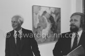 Max Ernst and Werner Spies. Behind them "Philosophie en plein air" by Dorothea Tanning. At the opening of the exhibition "Dorothea Tanning: Oeuvre" (retrospective), Centre National d'Art Contemporain, Paris, May 28 - July 8, 1974. - Photo by Edward Quinn