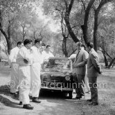Juan Manuel Fangio and Jean Behra. Presentation of new Vespa 400 1957. Monaco 1957. See www.spiritracerclub.org/vespa-400-la-puce-du-rallye-de-monte-carlo/ - Photo by Edward Quinn