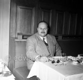 Farouk, ex King of Egypt, at the Nice train station, Buffet de la Gare, 1954. Car: 1947 Nash 600 Ambassador Custom - Photo by Edward Quinn