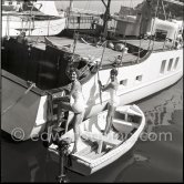 Fashion models cruising along the Côte d'Azur on board the yacht Vacation I. Monaco 1955. - Photo by Edward Quinn