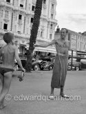 Jacques Fath, French couturier, and his son on the Croisette, Cannes 1954. - Photo by Edward Quinn