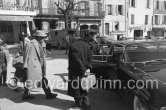 French actor Fernandel during filming of "Crésus" ("Croesus"). Forcalquier, Alpes-de-Haute-Provence 1960. Car: 1959 Cadillac Series 62 style 6239 four-window sedan or 6339 four-window sedan de Ville - Photo by Edward Quinn
