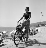 English fashion model with Vélosolex. Cannes 1951. - Photo by Edward Quinn