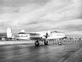 The private plane of Porfirio Rubirosa, a converted North American B-25 Mitchell, at Cannes Airport in 1954. North American B-25 Mitchell B-25H-1NA 43-4432 (N10V). See https://bit.ly/2XS08rs. Was as "Berlin Express" in the 1970 movie Catch-22. Today at Eagle Hangar, EAA Aviation Museum, Oshkosh. - Photo by Edward Quinn