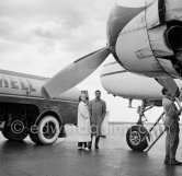 Zsa Zsa Gabor and Porfirio Rubirosa in front of the private plane of Porfirio Rubirosa, a converted North American B-25 Mitchell, at Cannes Airport in 1954. North American B-25 Mitchell B-25H-1NA 43-4432 (N10V). See https://bit.ly/2XS08rs. Was as "Berlin Express" in the 1970 movie Catch-22. Today at Eagle Hangar, EAA Aviation Museum, Oshkosh. - Photo by Edward Quinn