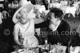 Hungarian actress Zsa Zsa Gabor with the British actor Laurence Harvey at the Cannes Film Festival in 1959. - Photo by Edward Quinn