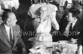 Hungarian actress Zsa Zsa Gabor with the British actor Laurence Harvey and her current boyfriend, millionaire Hal Hayes (left). at the Cannes Film Festival in 1959. - Photo by Edward Quinn