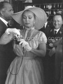 Zsa Zsa Gabor with a Kodak Starflash, her current boyfriend, millionaire Hal Hayes on the left. Cannes 1959. - Photo by Edward Quinn