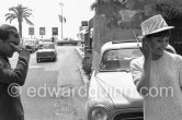 Jean-Luc Godard and Anna Karina. Cannes 1960. Car: Peugeot 403 - Photo by Edward Quinn