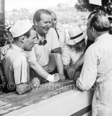 Stirling Moss, Anthony Hume, Moss' father Alfred and Reginald Parnell (from left). Monaco Grand Prix 1952, transformed into a race for sports cars. This was a two day event, the Sunday for the up to 2 litres (Prix de Monte Carlo), the Monday for the bigger engines, (Monaco Grand Prix). - Photo by Edward Quinn
