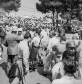 Last instructions to the drivers by Race Director, (Directeur de Course) Charles Faroux, (with hat). Tommy Wisdom with dark helmet, Stirling Moss, Reginald Parnell, Anthony Hume. Monaco Grand Prix 1952, transformed into a race for sports cars. This was a two day event, the Sunday, Prix Monte Carlo, for the up to 2 litres (Prix de Monte Carlo), the Grand Prix, Monday for the bigger engines, (Monaco Grand Prix). - Photo by Edward Quinn