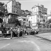 The accident at Sainte-Dévote: Anthony Hume, (84) (left) Allard J2. Monaco Grand Prix 1952, transformed into a race for sports cars. This was a two day event, the Sunday, Prix Monte Carlo, for the up to 2 litres (Prix de Monte Carlo), the Grand Prix, Monday for the bigger engines, (Monaco Grand Prix). The Aston engine of Parnell blows up in the Ste-Devote and aligns his car against the straw bales, Stagnoli brakes too hard and does a double spin. Moss, Jaguar C-Type XKC 003 and Manzon find an obstructed road, spin and end up against the poor Aston, then Hume spins and reverses into the pile. Fortunately nobody gets hurt. Moss restarted after the accident, but got a black flag for receiving outside help. - Photo by Edward Quinn