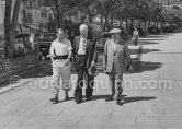 Stirling Moss, in the middle Earl Howe, former racing driver, president of British Racing Drivers' Club (BRDC) 1929-1964. Monaco Grand Prix 1955. - Photo by Edward Quinn