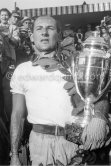 Stirling Moss with the winner's trophy. Monaco Grand Prix 1956. - Photo by Edward Quinn