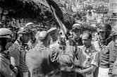 Driver's briefing, from left Maurice Trintignant, Juan Manuel Fangio, Harry Schell, Peter Collins, Wolfgang von Trips, Stirling Moss, Jack Brabham, Mike Hawthorn, Ivor Bueb. Monaco Grand Prix 1957. - Photo by Edward Quinn