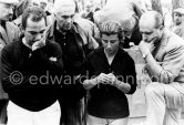 The sadness shown on the face of Fangio (right), Maria Teresa de Filippis, Piero Taruffi and Jean Behra was when it was annonced that Maria did not qualify for the Monaco Grand Prix 1959. - Photo by Edward Quinn