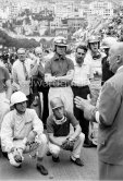 Driver briefing by Anthony Noghès: Wolfgang von Trips, John Cooper, Dan Gurney, Joakim Bonnier, squatting Phil Hill and Richie Ginther. Monaco Grand Prix 1960. - Photo by Edward Quinn