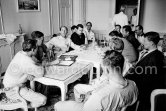 Stirling Moss as chairman addresses the inaugural meeting of a new racing drivers association (Grand Prix Drivers’ Association) in room 183 of Monte Carlo's hotel Metropole. On his left vice chairman Joakim Bonnier, hidden Jim Clark, and Masten Gregory, on his right the association's secretary Peter Garnier. In the foreground left Innes Ireland and right back to camera John Surtees. Back right Maurice Trintignant, Olivier Gendebien, Dan Gurney and Henry Taylor. Monaco Grand Prix 1961. - Photo by Edward Quinn