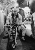 Stirling Moss enjoys riding around with his 1961 Trojan Trobike. Monaco Grand Prix 1961. - Photo by Edward Quinn