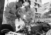 Stirling Moss, (20) Lotus-Climax. Alf Francis (left), chief mechanic of Rob Walker Racing Team. Monaco Grand Prix 1961. - Photo by Edward Quinn