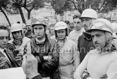 Driver briefing by Louis Chiron. From left: Trevor Taylor, Lorenzo Bandini, Willy Mairesse, Bruce McLaren, Roy Salvadori, Joakim Bonnier, Maurice Trintignant. Monaco Grand Prix 1962. - Photo by Edward Quinn