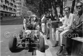 Jim Clark, (9) Lotus 25, and Colin Chapman (right), founder of Lotus Cars. Monaco Grand Prix 1963. - Photo by Edward Quinn