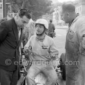 Phil Hill (9) Cooper T73, discussing with John Cooper (left) and mechanics. Monaco Grand Prix 1964. - Photo by Edward Quinn
