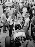 Jack Brabham is interested in Ronnie Bucknum's Honda RA272. Monaco Grand Prix 1965. - Photo by Edward Quinn