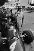 Jackie Stewart, (4) BRM P261, and Tony Rudd. Monaco Grand Prix 1965. - Photo by Edward Quinn