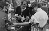 Before one of the trial runs, Niki Lauda's doctor gave him an injection and made a blood test. Laude rarely smiles, but submitted to this good humouredly. Monaco Grand Prix 1978. - Photo by Edward Quinn