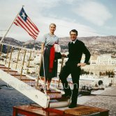 Cary Grant and his wife Betsy Drake on board Onassis' yacht Christina. Monaco harbor 1957. - Photo by Edward Quinn