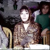 Juliette Gréco with her dog at the Cannes Film Festival 1959. - Photo by Edward Quinn