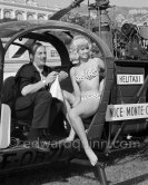 Val Guest, British writer-director-producer and Janette Scott, relaxing in a helicopter during the filming of «The Big Jungle». Monte Carlo 1963. - Photo by Edward Quinn