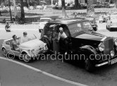 A parking problem in front of the Hotel de Paris in Monte Carlo. Loël Guinness and his wife in their mini car prevent Emery Reves, publisher of Churchill’s books in the U.S., from parking his big car. Monte Carlo 1958. Cars: Fiat 500 Jolly Ghia. 1948/49 Rolls-Royce Silver Wraith, #WZB29, Touring Limousine by Park Ward. Owner Emery Reves (Churchill’s U.S. publisher). Detailed info on this car by expert Klaus-Josef Rossfeldt see About/Additional Infos. - Photo by Edward Quinn