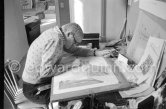 David Hockney working on the set design for "The Rake's Progress" at England’s Glyndebourne Opera Festival Paris 1975. - Photo by Edward Quinn