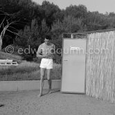 Rock Hudson on holidays at Cap d’Antibes. Until 1947 Hudson worked on odd jobs, finally in 1954 with the film "Magnificent Obsession" he was accepted as an actor and in 1957 he was a nominee for an Oscar for "Giant". Eden Roc 1954. - Photo by Edward Quinn