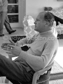 Curd Jürgens, who was the highest-paid actor in Europe, in the living room of his Villa Canzone della Mare, at Saint-Jean-Cap-Ferrat 1955. - Photo by Edward Quinn