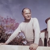 Curd Jürgens, who was the highest-paid actor in Europe, at his Villa Canzone della Mare, at Saint-Jean-Cap-Ferrat 1955. - Photo by Edward Quinn