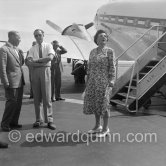 Dutch Royalty on holidays. Queen Juliana and her husband Prince Bernhard (centre with glasses) came to the Riviera to relax for a few days. Here they are arriving at Nice Airport. Nice 1956. - Photo by Edward Quinn