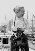 Grace Kelly with her Rolleiflex. Cannes Film Festival. Cannes harbor 1955. - Photo by Edward Quinn