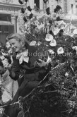 Grace Kelly at the battle of flowers. Cannes Film Festival. Cannes 1955. - Photo by Edward Quinn